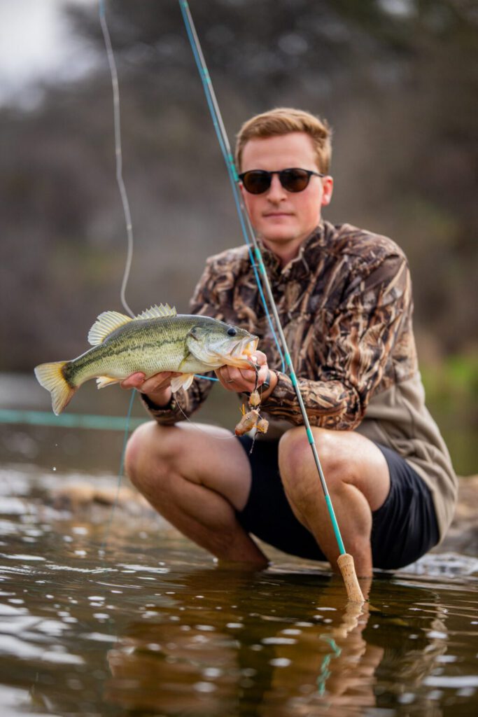 Robby With Bass On Frog 1024x1536 — Kicking Frog hand-tied fly