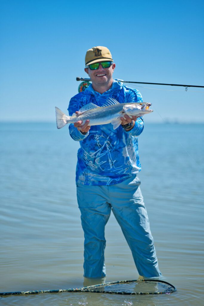 Levi With Speckled Trout 1365x2048 — Softball Shrimp hand-tied fly